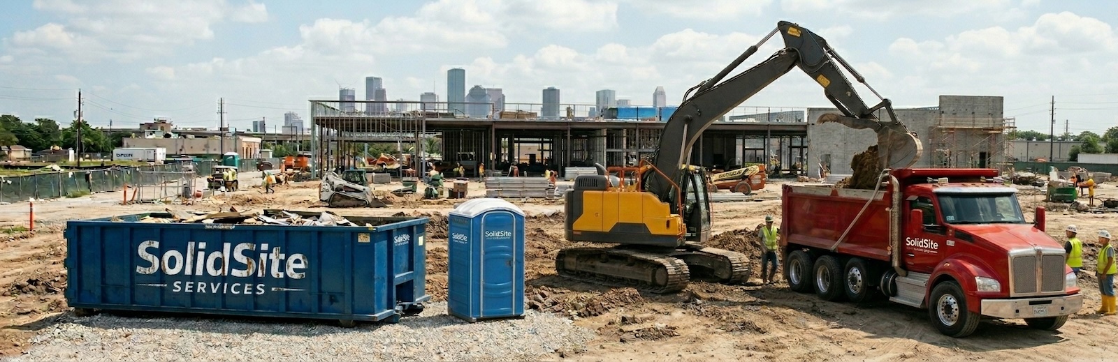 SolidSite-branded portable restroom on an active Houston jobsite